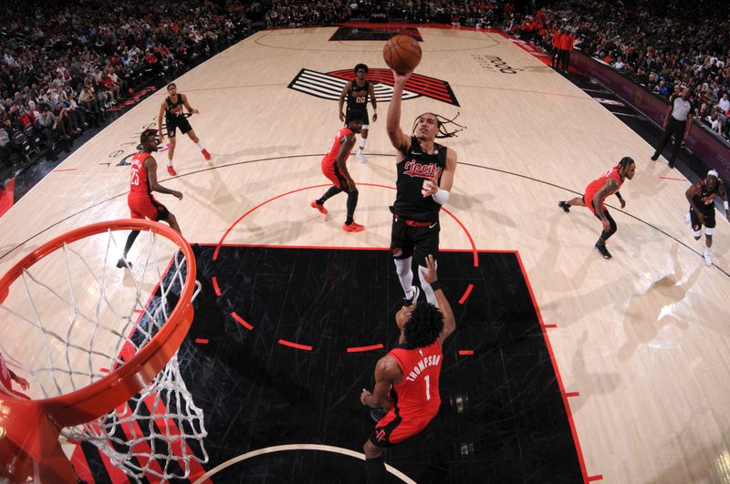 PORTLAND, OR - APRIL 12: Dalano Banton #5 of the Portland Trail Blazers shoots the ball during the game against the Houston Rockets on April 12, 2024 at the Moda Center Arena in Portland, Oregon. NOTE TO USER: User expressly acknowledges and agrees that, by downloading and or using this photograph, user is consenting to the terms and conditions of the Getty Images License Agreement. Mandatory Copyright Notice: Copyright 2024 NBAE (Photo by Cameron Browne/NBAE via Getty Images)