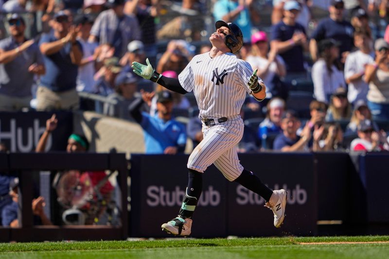 May 28, 2023; Bronx, New York, USA; New York Yankees center fielder Harrison Bader (22) reacts to hitting a home run as he rounds the bases against the San Diego Padres during the eighth inning at Yankee Stadium. Mandatory Credit: Gregory Fisher-USA TODAY Sports