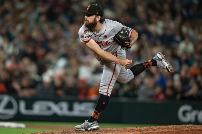 Aug 23, 2024; Seattle, Washington, USA; San Francisco Giants reliever Ryan Walker (74) delivers a pitch during the eighth inning Mariners at T-Mobile Park. Mandatory Credit: Stephen Brashear-USA TODAY Sports