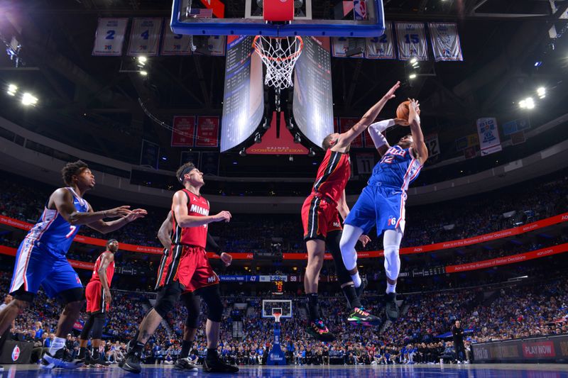 PHILADELPHIA, PA - APRIL 17: Tobias Harris #12 of the Philadelphia 76ers shoots the ball during the game against the Miami Heat during the 2024 NBA Play-In Tournament on April 17, 2024 at the Wells Fargo Center in Philadelphia, Pennsylvania NOTE TO USER: User expressly acknowledges and agrees that, by downloading and/or using this Photograph, user is consenting to the terms and conditions of the Getty Images License Agreement. Mandatory Copyright Notice: Copyright 2024 NBAE (Photo by Jesse D. Garrabrant/NBAE via Getty Images)