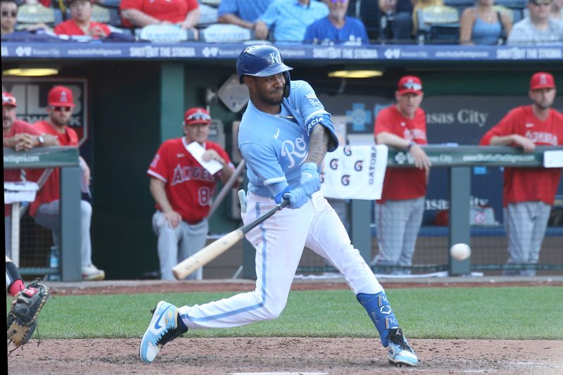 Jun 17, 2023; Kansas City, Missouri, USA; Kansas City Royals third baseman Maikel Garcia (11) swings at a pitch in the bottom of the ninth inning against the Los Angeles Angels at Kauffman Stadium. Mandatory Credit: Scott Sewell-USA TODAY Sports