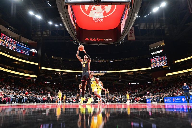 ATLANTA, GA - JANUARY 12: Dejounte Murray #5 of the Atlanta Hawks shoots the ball during the game against the Indiana Pacers on January 12, 2024 at State Farm Arena in Atlanta, Georgia.  NOTE TO USER: User expressly acknowledges and agrees that, by downloading and/or using this Photograph, user is consenting to the terms and conditions of the Getty Images License Agreement. Mandatory Copyright Notice: Copyright 2024 NBAE (Photo by Adam Hagy/NBAE via Getty Images)