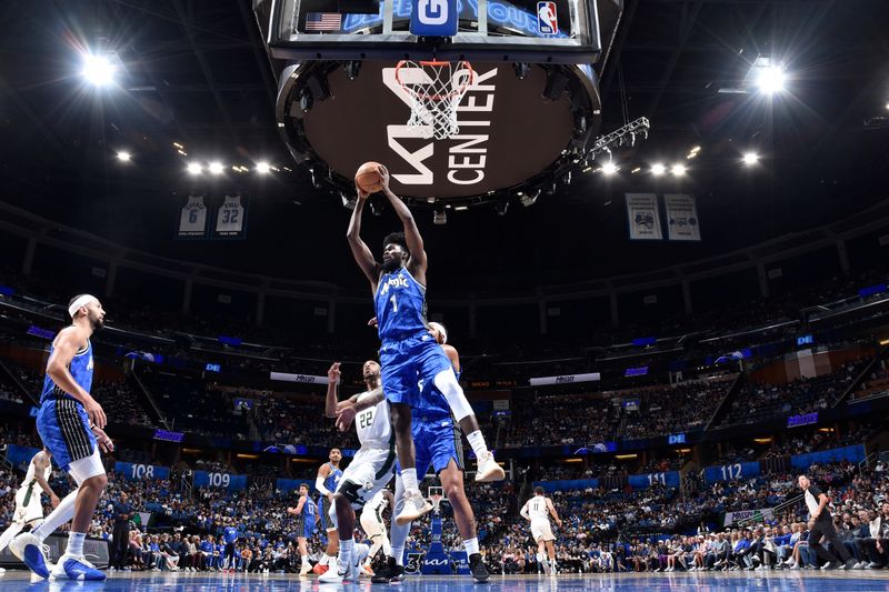 ORLANDO, FL - APRIL 14: Jonathan Isaac #1 of the Orlando Magic grabs a rebound during the game against the Milwaukee Bucks  on April 14, 2024 at Kia Center in Orlando, Florida. NOTE TO USER: User expressly acknowledges and agrees that, by downloading and or using this photograph, User is consenting to the terms and conditions of the Getty Images License Agreement. Mandatory Copyright Notice: Copyright 2024 NBAE (Photo by Fernando Medina/NBAE via Getty Images)