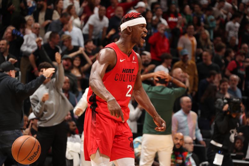 MIAMI, FL - NOVEMBER 24: Jimmy Butler #22 of the Miami Heat celebrates during the game against the Dallas Mavericks on November 24, 2024 at Kaseya Center in Miami, Florida. NOTE TO USER: User expressly acknowledges and agrees that, by downloading and or using this Photograph, user is consenting to the terms and conditions of the Getty Images License Agreement. Mandatory Copyright Notice: Copyright 2024 NBAE (Photo by Issac Baldizon/NBAE via Getty Images)