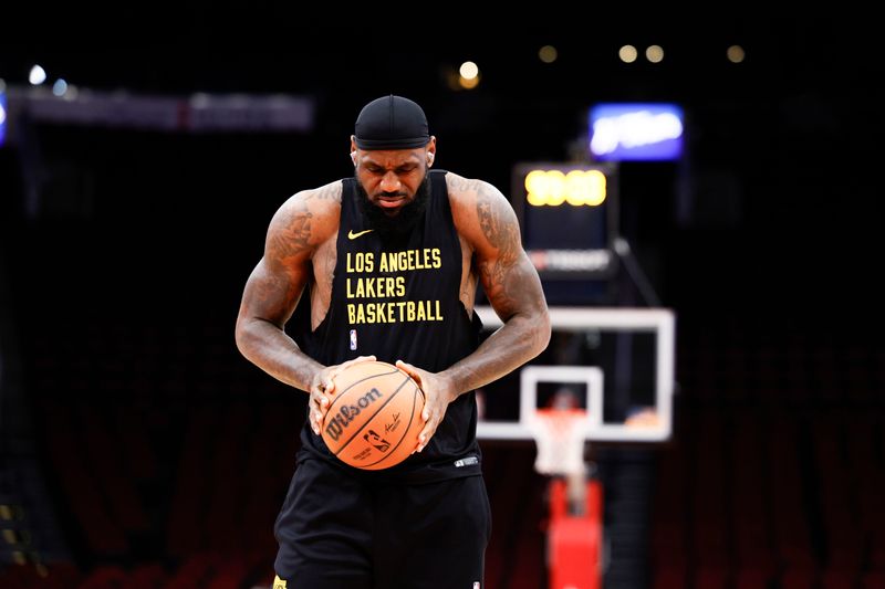 HOUSTON, TEXAS - NOVEMBER 08: LeBron James #23 of the Los Angeles Lakers warms up prior to facing the Houston Rockets at Toyota Center on November 08, 2023 in Houston, Texas. NOTE TO USER: User expressly acknowledges and agrees that, by downloading and or using this photograph, User is consenting to the terms and conditions of the Getty Images License Agreement.? (Photo by Carmen Mandato/Getty Images)