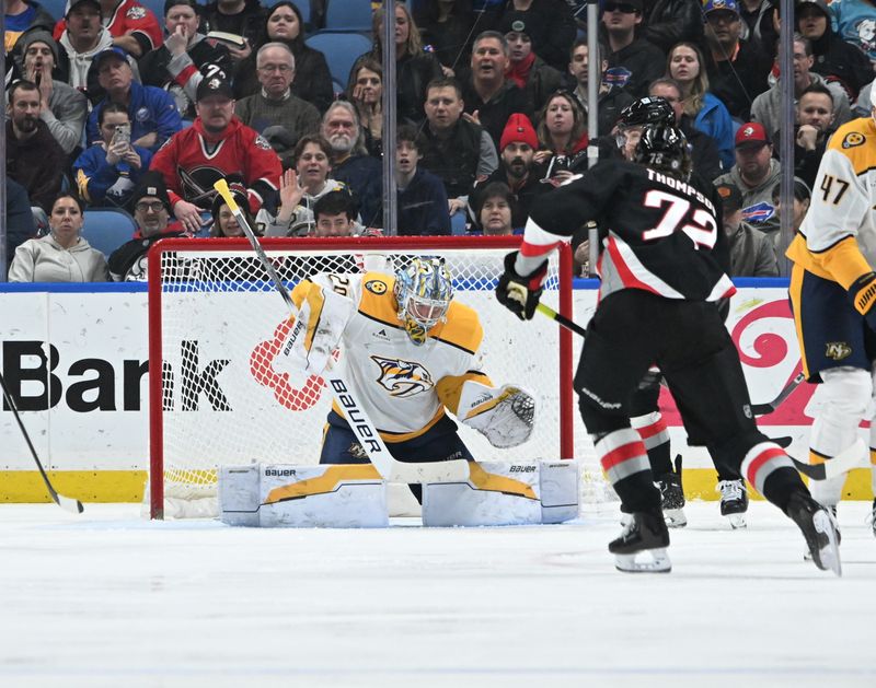 Jan 31, 2025; Buffalo, New York, USA; Nashville Predators goaltender Justus Annunen (29) prepares to stop a shot by Buffalo Sabres center Tage Thompson (72) in the third period at the KeyBank Center. Mandatory Credit: Mark Konezny-Imagn Images