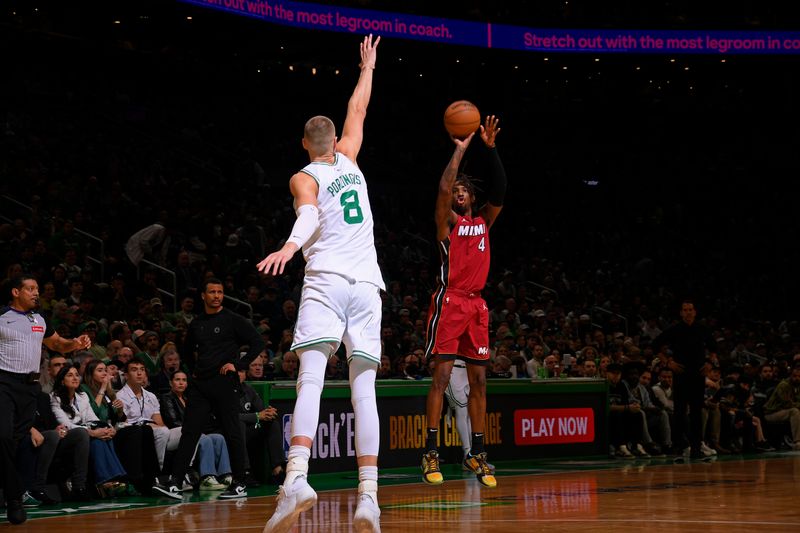 BOSTON, MA - APRIL 21: Delon Wright #4 of the Miami Heat shoots a three point basket against the Boston Celtics during Round 1 Game 1 of the 2024 NBA Playoffs on April 21, 2024 at the TD Garden in Boston, Massachusetts. NOTE TO USER: User expressly acknowledges and agrees that, by downloading and or using this photograph, User is consenting to the terms and conditions of the Getty Images License Agreement. Mandatory Copyright Notice: Copyright 2024 NBAE  (Photo by Brian Babineau/NBAE via Getty Images)