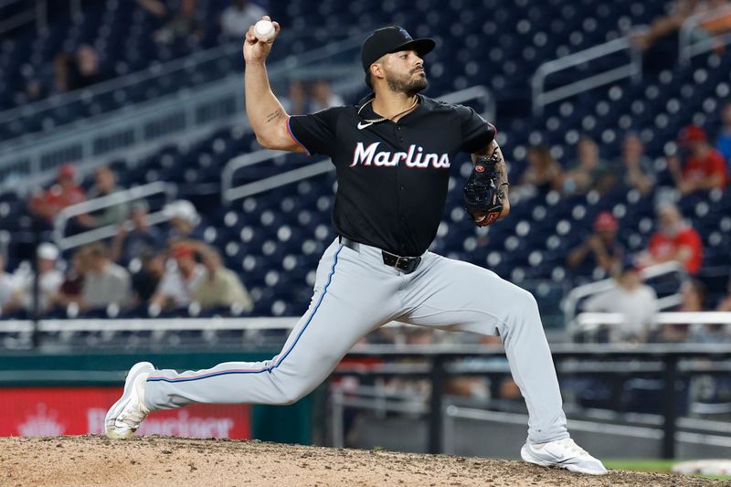 Sep 12, 2024; Washington, District of Columbia, USA; Miami Marlins pitcher Jesus Tinoco (38) pitches against the Washington Nationals during the ninth inning at Nationals Park. Mandatory Credit: Geoff Burke-Imagn Images