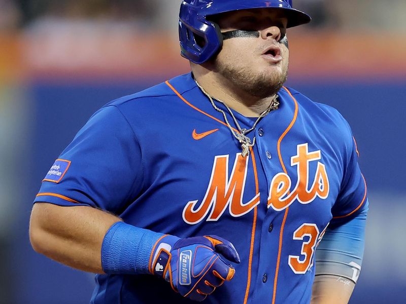 Aug 14, 2023; New York City, New York, USA; New York Mets designated hitter Daniel Vogelbach (32) rounds the bases after hitting a solo home run against the Pittsburgh Pirates during the second inning at Citi Field. Mandatory Credit: Brad Penner-USA TODAY Sports