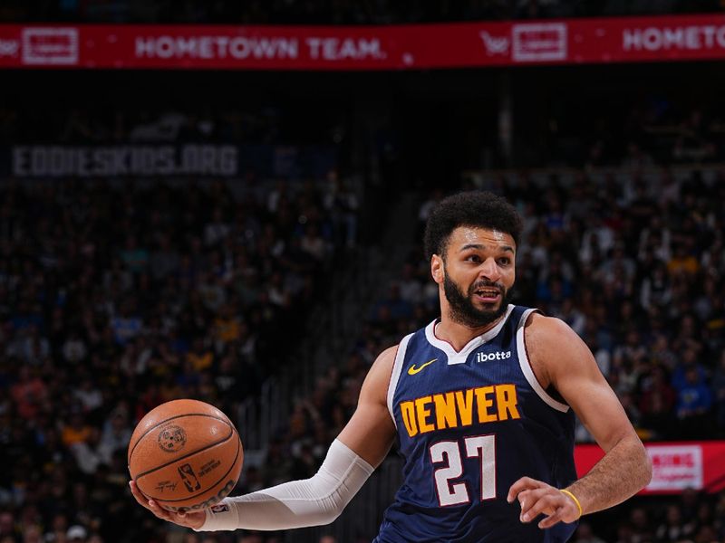 DENVER, CO - APRIL 10: Jamal Murray #27 of the Denver Nuggets drives to the basket during the game against the Minnesota Timberwolves on April 10, 2024 at the Ball Arena in Denver, Colorado. NOTE TO USER: User expressly acknowledges and agrees that, by downloading and/or using this Photograph, user is consenting to the terms and conditions of the Getty Images License Agreement. Mandatory Copyright Notice: Copyright 2024 NBAE (Photo by Bart Young/NBAE via Getty Images)