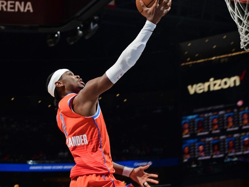 ATLANTA, GA - FEBRUARY 28: Shai Gilgeous-Alexander #2 of the Oklahoma City Thunder drives to the basket during the game against the Atlanta Hawks on February 28, 2025 at State Farm Arena in Atlanta, Georgia.  NOTE TO USER: User expressly acknowledges and agrees that, by downloading and/or using this Photograph, user is consenting to the terms and conditions of the Getty Images License Agreement. Mandatory Copyright Notice: Copyright 2025 NBAE (Photo by Scott Cunningham/NBAE via Getty Images)