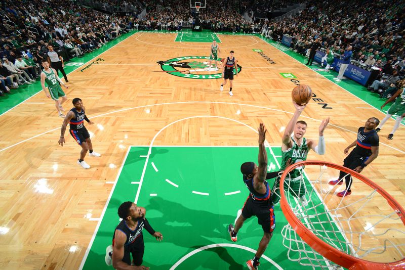 BOSTON, MA - DECEMBER 12: Kristaps Porzingis #8 of the Boston Celtics drives to the basket during the game against the Detroit Pistons on December 12, 2024 at TD Garden in Boston, Massachusetts. NOTE TO USER: User expressly acknowledges and agrees that, by downloading and/or using this Photograph, user is consenting to the terms and conditions of the Getty Images License Agreement. Mandatory Copyright Notice: Copyright 2024 NBAE (Photo by Brian Babineau/NBAE via Getty Images)