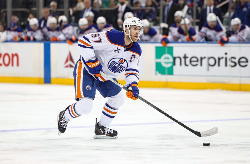 Mar 16, 2025; New York, New York, USA; Edmonton Oilers center Connor McDavid (97) looks to pass against the New York Rangers during the first period at Madison Square Garden. Mandatory Credit: Danny Wild-Imagn Images