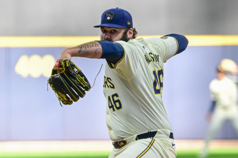 May 29, 2024; Milwaukee, Wisconsin, USA; Milwaukee Brewers starting pitcher Bryse Wilson (46) pitches against the Chicago Cubs in the first inning at American Family Field. Mandatory Credit: Benny Sieu-USA TODAY Sports