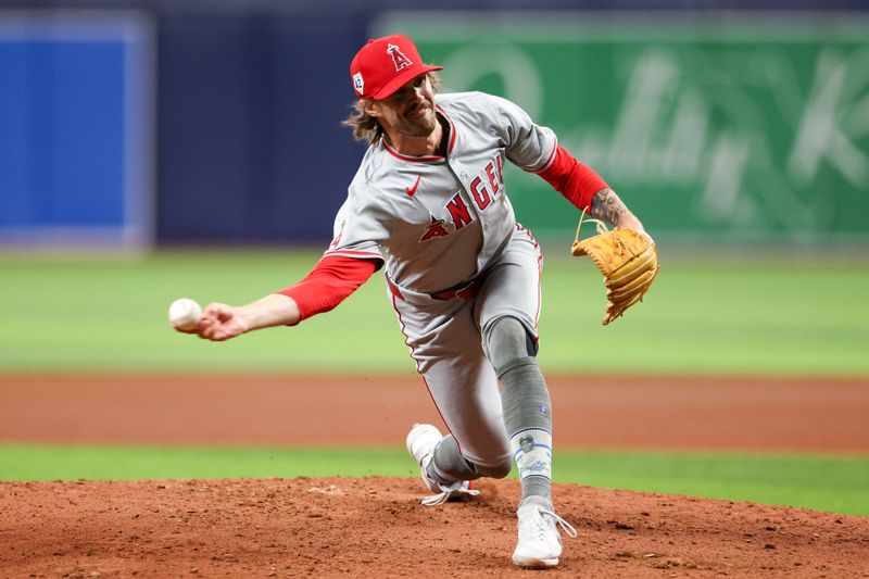 Apr 15, 2024; St. Petersburg, Florida, USA;  Los Angeles Angels pitcher Adam Cimber (42) throws a pitch against the Tampa Bay Rays in the sixth inning during Jackie Robinson day at Tropicana Field. Mandatory Credit: Nathan Ray Seebeck-USA TODAY Sports