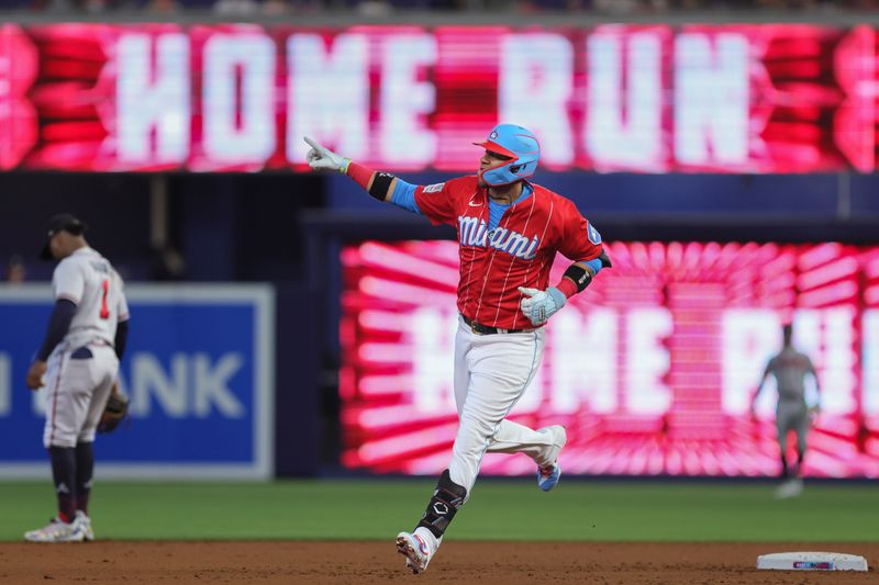 Sep 16, 2023; Miami, Florida, USA; Miami Marlins first baseman Yuli Gurriel (10) circles the bases after hitting a two-run home run against the Atlanta Braves during the first inning at loanDepot Park. Mandatory Credit: Sam Navarro-USA TODAY Sports