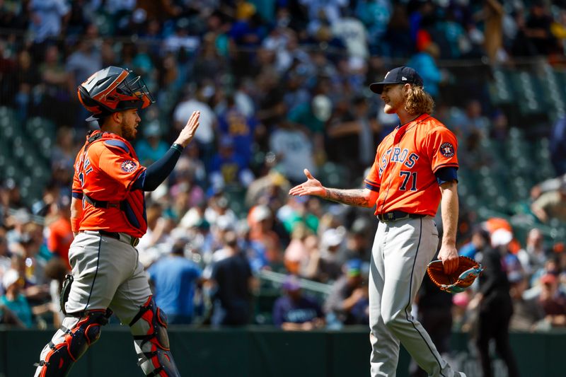 May 30, 2024; Seattle, Washington, USA; Houston Astros relief pitcher Josh Hader (71) shakes hands with catcher Victor Caratini (17) following a 4-0 victory against the Seattle Mariners at T-Mobile Park. Mandatory Credit: Joe Nicholson-USA TODAY Sports