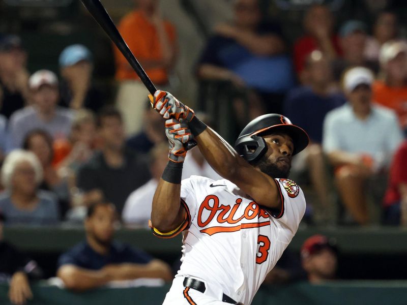 Mar 14, 2025; Sarasota, Florida, USA;  Baltimore Orioles outfielder Cedric Mullins (31) hits a sacrifice RBI during the fifth inning against the Minnesota Twins at Ed Smith Stadium. Mandatory Credit: Kim Klement Neitzel-Imagn Images