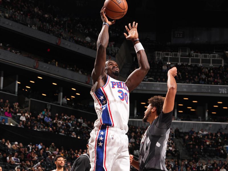 BROOKLYN, NY - FEBRUARY 12: Adem Bona #30 of the Philadelphia 76ers drives to the basket during the game against the Brooklyn Nets on February 12, 2025 at Barclays Center in Brooklyn, New York. NOTE TO USER: User expressly acknowledges and agrees that, by downloading and or using this Photograph, user is consenting to the terms and conditions of the Getty Images License Agreement. Mandatory Copyright Notice: Copyright 2025 NBAE (Photo by Jesse D. Garrabrant/NBAE via Getty Images)