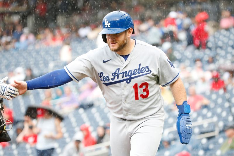 Sep 10, 2023; Washington, District of Columbia, USA; Los Angeles Dodgers designated hitter Max Muncy (13) celebrates after scoring on a RBI against in the fifth inning the Washington Nationals at Nationals Park. Mandatory Credit: Amber Searls-USA TODAY Sports