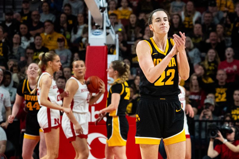 Feb 11, 2024; Lincoln, Nebraska, USA; Iowa Hawkeyes guard Caitlin Clark (22) reacts to a call against the Nebraska Cornhuskers during the first quarter at Pinnacle Bank Arena. Mandatory Credit: Dylan Widger-USA TODAY Sports