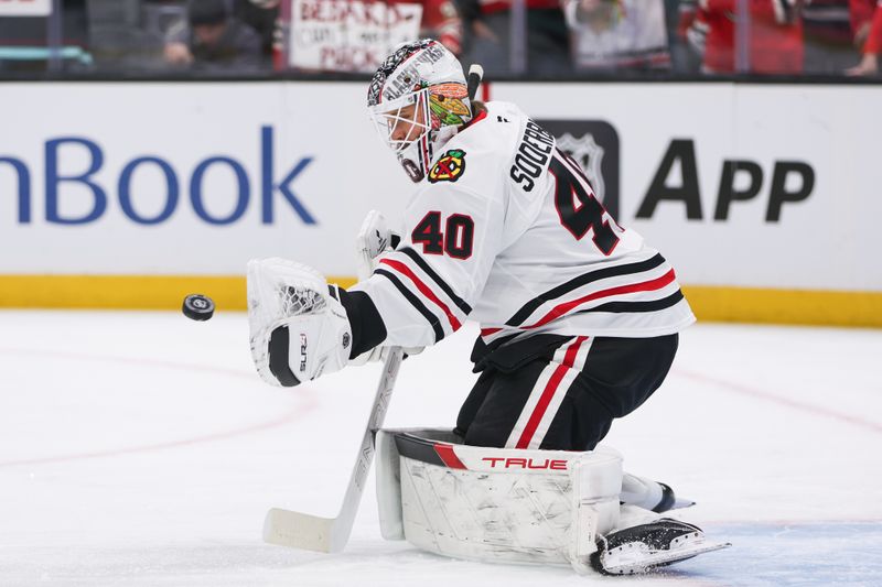 Nov 3, 2025; Seattle, Washington, USA; Chicago Blackhawks goalie Spencer Knight (30) warms up before the game against the Seattle Kraken at Climate Pledge Arena. Mandatory Credit: Kevin Ng-Imagn Images