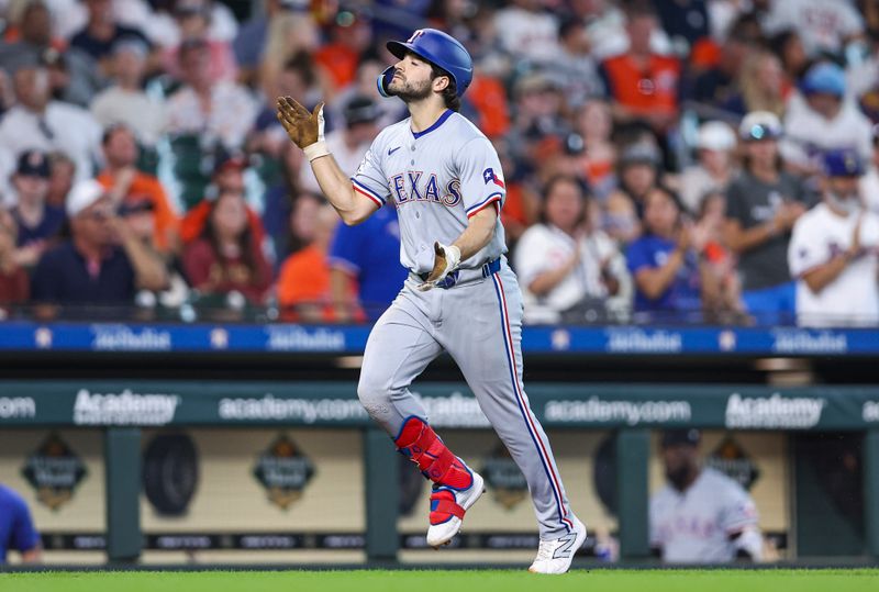 Jul 14, 2024; Houston, Texas, USA; Texas Rangers third baseman Josh Smith (8) rounds the bases after hitting a home run during the eighth inning against the Houston Astros at Minute Maid Park. Mandatory Credit: Troy Taormina-USA TODAY Sports