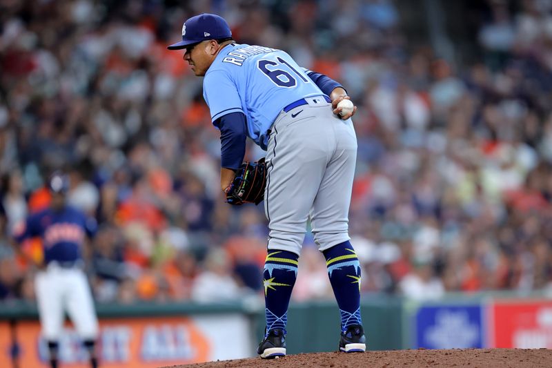 Jul 30, 2023; Houston, Texas, USA; Tampa Bay Rays relief pitcher Erasmo Ramirez (61) prepares to deliver a pitch against the Houston Astros during the sixth inning at Minute Maid Park. Mandatory Credit: Erik Williams-USA TODAY Sports