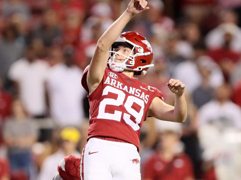 Sep 16, 2023; Fayetteville, Arkansas, USA; Arkansas Razorbacks kicker Cam Little (29) kicks a field goal as time expires in the first half against the BYU Cougars at Donald W. Reynolds Razorback Stadium. Mandatory Credit: Nelson Chenault-USA TODAY Sports