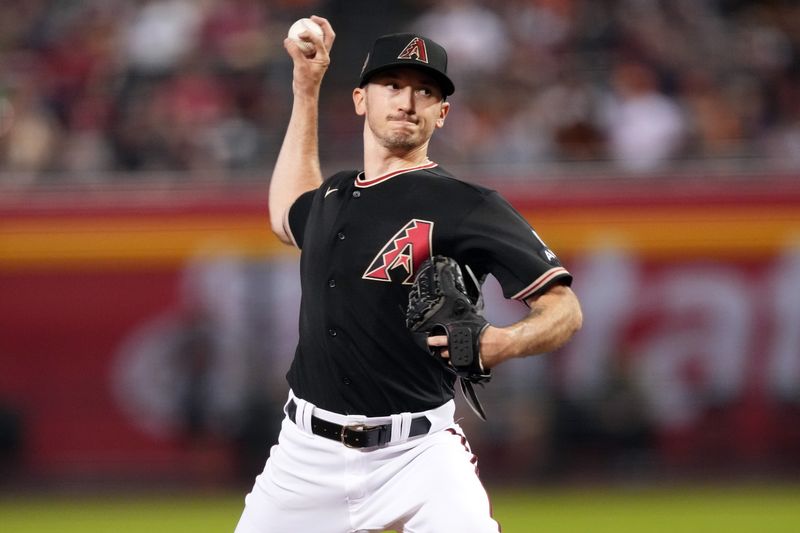 Sep 1, 2023; Phoenix, Arizona, USA; Arizona Diamondbacks starting pitcher Zach Davies (27) pitches against the Baltimore Orioles during the first inning at Chase Field. Mandatory Credit: Joe Camporeale-USA TODAY Sports