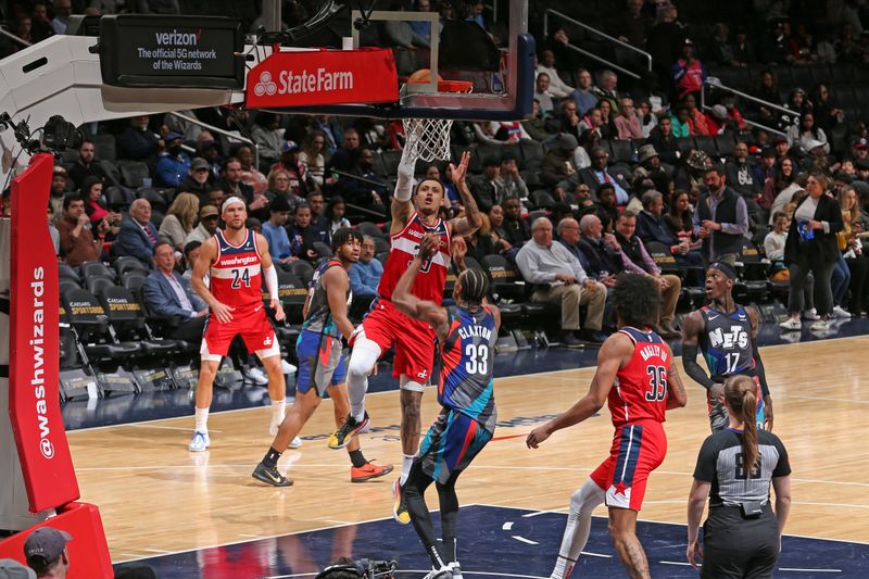 WASHINGTON, DC -? MARCH 27: Kyle Kuzma #33 of the Washington Wizards shoots the ball during the game aBrooklyn Nets  on March 27, 2024 at Capital One Arena in Washington, DC. NOTE TO USER: User expressly acknowledges and agrees that, by downloading and or using this Photograph, user is consenting to the terms and conditions of the Getty Images License Agreement. Mandatory Copyright Notice: Copyright 2024 NBAE (Photo by Stephen Gosling/NBAE via Getty Images)