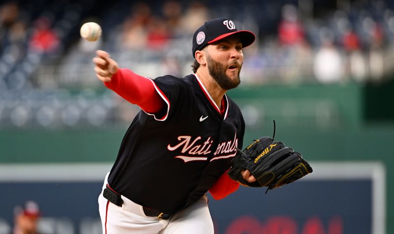 May 22, 2025; Washington, District of Columbia, USA; Washington Nationals pitcher Trevor Williams (32) throws to the Atlanta Braves during the first inning at Nationals Park. Mandatory Credit: Brad Mills-Imagn Images