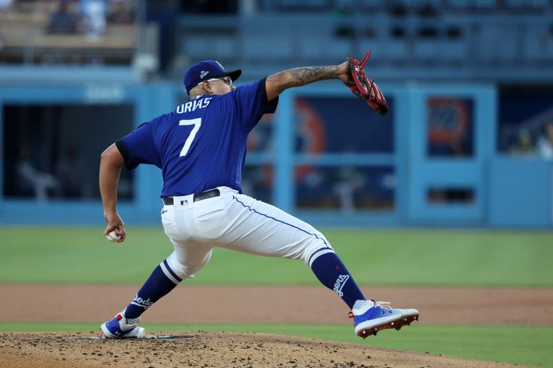 Aug 3, 2023; Los Angeles, California, USA;  Los Angeles Dodgers starting pitcher Julio Urias (7) pitches during the second inning against the Oakland Athletics at Dodger Stadium. Mandatory Credit: Kiyoshi Mio-USA TODAY Sports