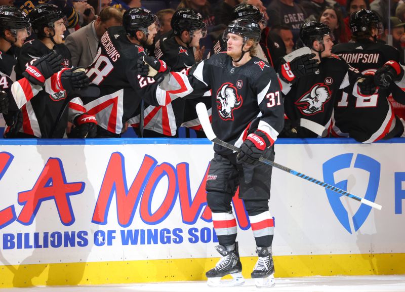 Mar 2, 2024; Buffalo, New York, USA;  Buffalo Sabres center Casey Mittelstadt (37) celebrates his goal with teammates during the third period against the Vegas Golden Knights at KeyBank Center. Mandatory Credit: Timothy T. Ludwig-USA TODAY Sports