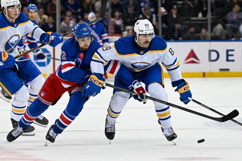 Nov 7, 2024; New York, New York, USA;  Buffalo Sabres right wing Alex Tuch (89) and New York Rangers center Filip Chytil (72) battle for a loose puck during the second period at Madison Square Garden. Mandatory Credit: Dennis Schneidler-Imagn Images