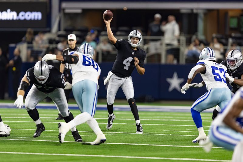 Las Vegas Raiders quarterback Aidan O'Connell (4) is seen during the second half of an NFL football game against the Dallas Cowboys, Saturday, Aug. 26, 2023, in Arlington, Texas. Dallas won 31-16. (AP Photo/Brandon Wade)