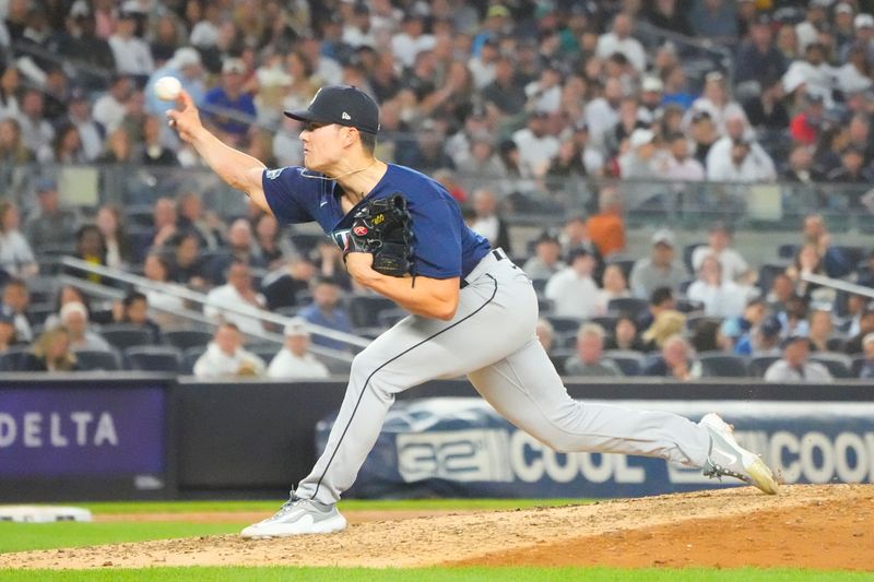 Jun 22, 2023; Bronx, New York, USA; Seattle Mariners pitcher Bryan Woo (33) delivers a pitch against the New York Yankees during the fourth inning at Yankee Stadium. Mandatory Credit: Gregory Fisher-USA TODAY Sports