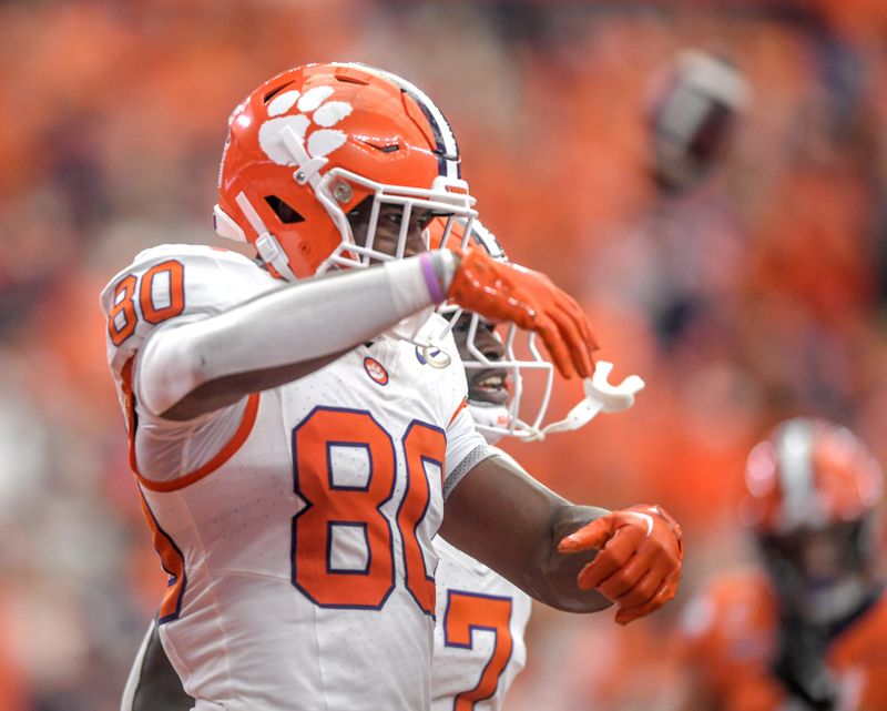 Sep 30, 2023; Syracuse, New York, USA; Clemson Tigers wide receiver Beaux Collins (80) celebrates his touchdown against the Syracuse Orange during the second quarter at JMA Wireless Dome Mandatory Credit: Ken Ruinard-USA TODAY Sports

