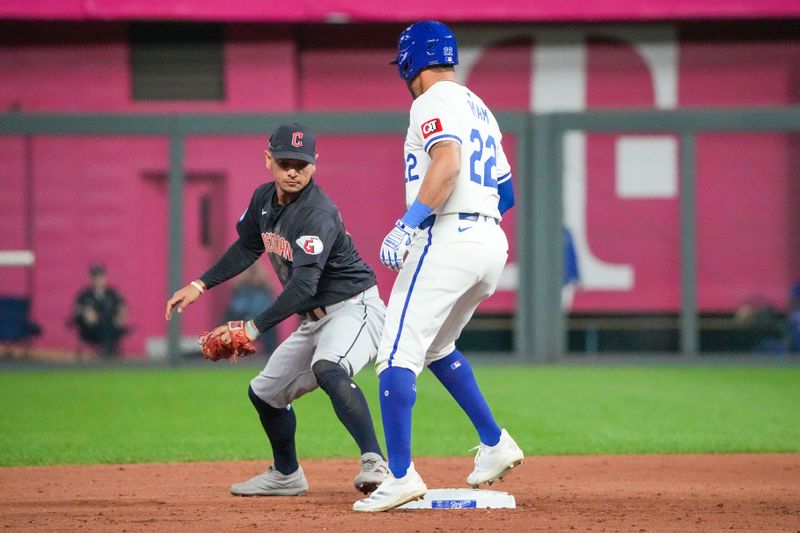 Sep 3, 2024; Kansas City, Missouri, USA; Cleveland Guardians second baseman Andrés Giménez (0) can’t make the out as Kansas City Royals right fielder Tommy Pham (22) doubles in the sixth inning at Kauffman Stadium. Mandatory Credit: Denny Medley-Imagn Images