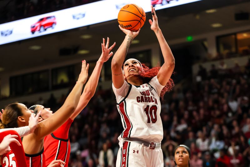 Feb 18, 2024; Columbia, South Carolina, USA; South Carolina Gamecocks center Kamilla Cardoso (10) shoots against the Georgia Lady Bulldogs in the second half at Colonial Life Arena. Mandatory Credit: Jeff Blake-USA TODAY Sports