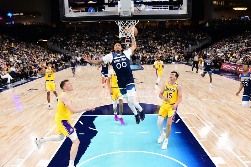 PALM SPRINGS, CA - OCTOBER 4: Terrence Shannon #00 of the Minnesota Timberwolves dunks the ball during the game against the Los Angeles Lakers during an NBA preseason game on October 4, 2024 at Acrisure Arena in Palm Springs, California. NOTE TO USER: User expressly acknowledges and agrees that, by downloading and/or using this Photograph, user is consenting to the terms and conditions of the Getty Images License Agreement. Mandatory Copyright Notice: Copyright 2024 NBAE (Photo by Adam Pantozzi/NBAE via Getty Images)