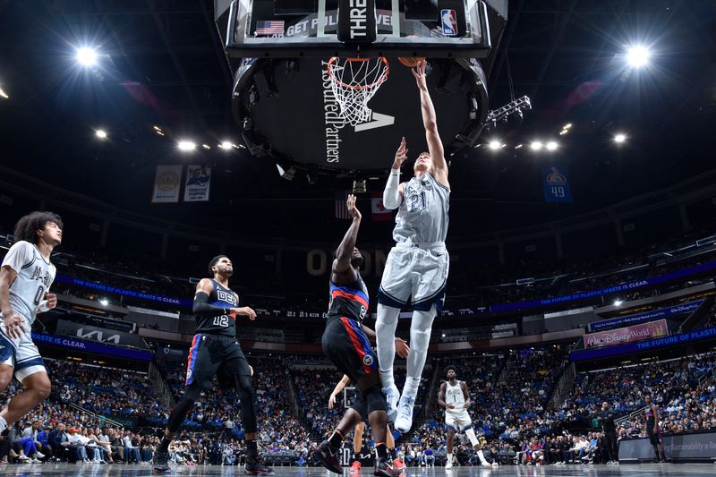 ORLANDO, FL - NOVEMBER 23: Moritz Wagner #21 of the Orlando Magic drives to the basket during the game against the Detroit Pistons  on November 23, 2024 at Kia Center in Orlando, Florida. NOTE TO USER: User expressly acknowledges and agrees that, by downloading and or using this photograph, User is consenting to the terms and conditions of the Getty Images License Agreement. Mandatory Copyright Notice: Copyright 2024 NBAE (Photo by Fernando Medina/NBAE via Getty Images)