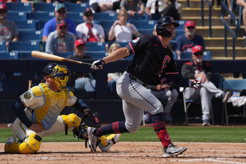 Mar 16, 2025; Phoenix, Arizona, USA; Cleveland Guardians outfielder Will Brennan (17) hits against the Milwaukee Brewers in the second inning at American Family Fields of Phoenix. Mandatory Credit: Rick Scuteri-Imagn Images