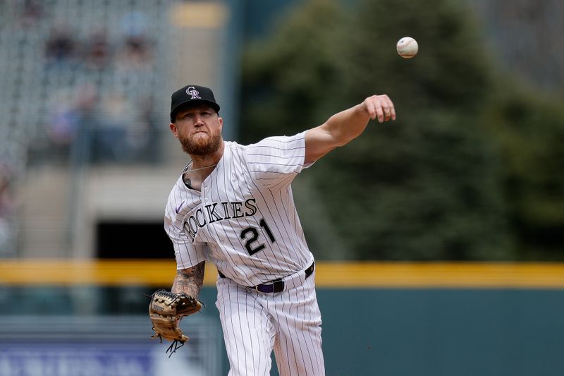 Apr 20, 2025; Denver, Colorado, USA; Colorado Rockies starting pitcher Kyle Freeland (21) pitches in the first inning against the Washington Nationals at Coors Field. Mandatory Credit: Isaiah J. Downing-Imagn Images