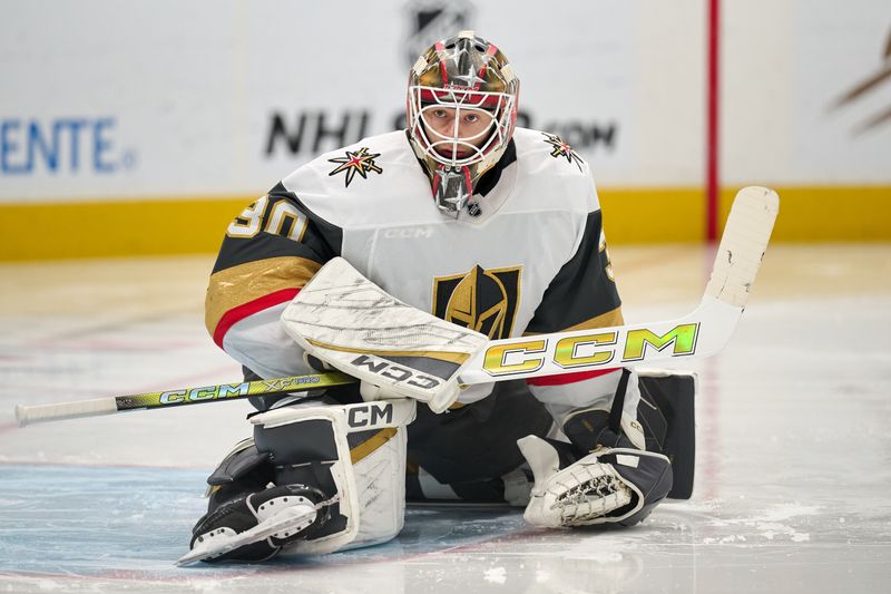 Jan 11, 2026; San Jose, California, USA; Vegas Golden Knights goaltender Carl Lindbom (30) stretches before the second period against the San Jose Sharks at SAP Center at San Jose. Mandatory Credit: Robert Edwards-Imagn Images