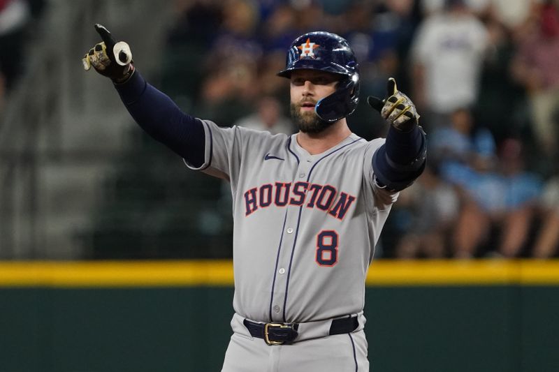May 17, 2025; Arlington, Texas, USA; Houston Astros first baseman Christian Walker (8) reacts towards the dugout after hitting an RBI double during the first inning against the Texas Rangers at Globe Life Field. Mandatory Credit: Raymond Carlin III-Imagn Images