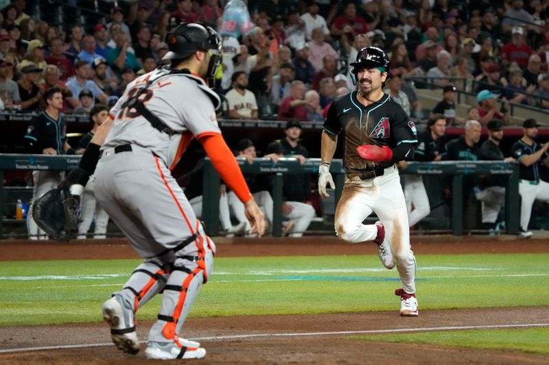 Jun 5, 2024; Phoenix, Arizona, USA; Arizona Diamondbacks outfielder Corbin Carroll (7) scores a run against the San Francisco Giants in the first inning at Chase Field. Mandatory Credit: Rick Scuteri-USA TODAY Sports