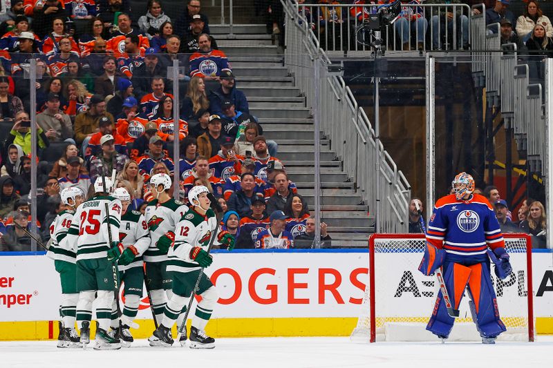 Nov 21, 2024; Edmonton, Alberta, CAN; The Minnesota Wild celebrate a goal scored by forward Matt Boldy (12) during the first period against the Edmonton Oilers at Rogers Place. Mandatory Credit: Perry Nelson-Imagn Images