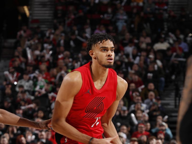 PORTLAND, OR - MARCH 9: Rayan Rupert #72 of the Portland Trail Blazers looks to pass the ball during the game against the Toronto Raptors on March 9, 2024 at the Moda Center Arena in Portland, Oregon. NOTE TO USER: User expressly acknowledges and agrees that, by downloading and or using this photograph, user is consenting to the terms and conditions of the Getty Images License Agreement. Mandatory Copyright Notice: Copyright 2024 NBAE (Photo by Cameron Browne/NBAE via Getty Images)