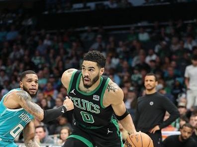 CHARLOTTE, NC - NOVEMBER 20: Jayson Tatum #0 of the Boston Celtics drives to the basket during the game against the Charlotte Hornets on November 20, 2023 at Spectrum Center in Charlotte, North Carolina. NOTE TO USER: User expressly acknowledges and agrees that, by downloading and or using this photograph, User is consenting to the terms and conditions of the Getty Images License Agreement.  Mandatory Copyright Notice:  Copyright 2023 NBAE (Photo by Brock Williams-Smith/NBAE via Getty Images)